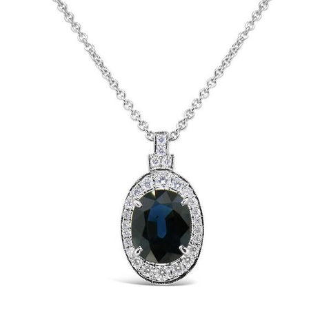 Australian sapphire and diamond halo pendant by Imp Jewellery